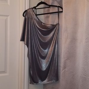 Metallic silver blouse.